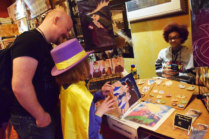 Artist selling prints in the SoonerCon Artist Alley